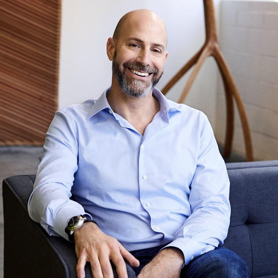 Etsy CEO Josh Silverman posing for the camera.