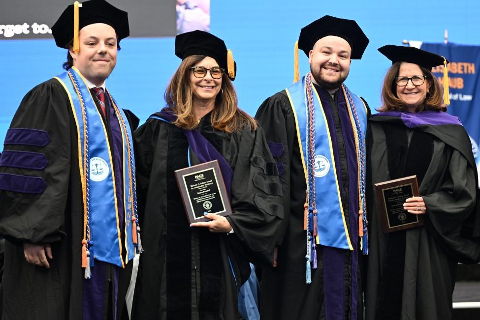 Elisabeth Haub School of Law at Pace University Professors Leslie Tenzer and Robin Frankel with studentsh students at 2025 Commencement